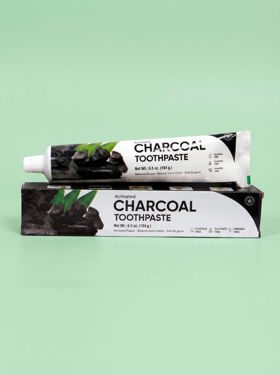 Coral Oral charcoal toothpaste front view with activated charcoal
